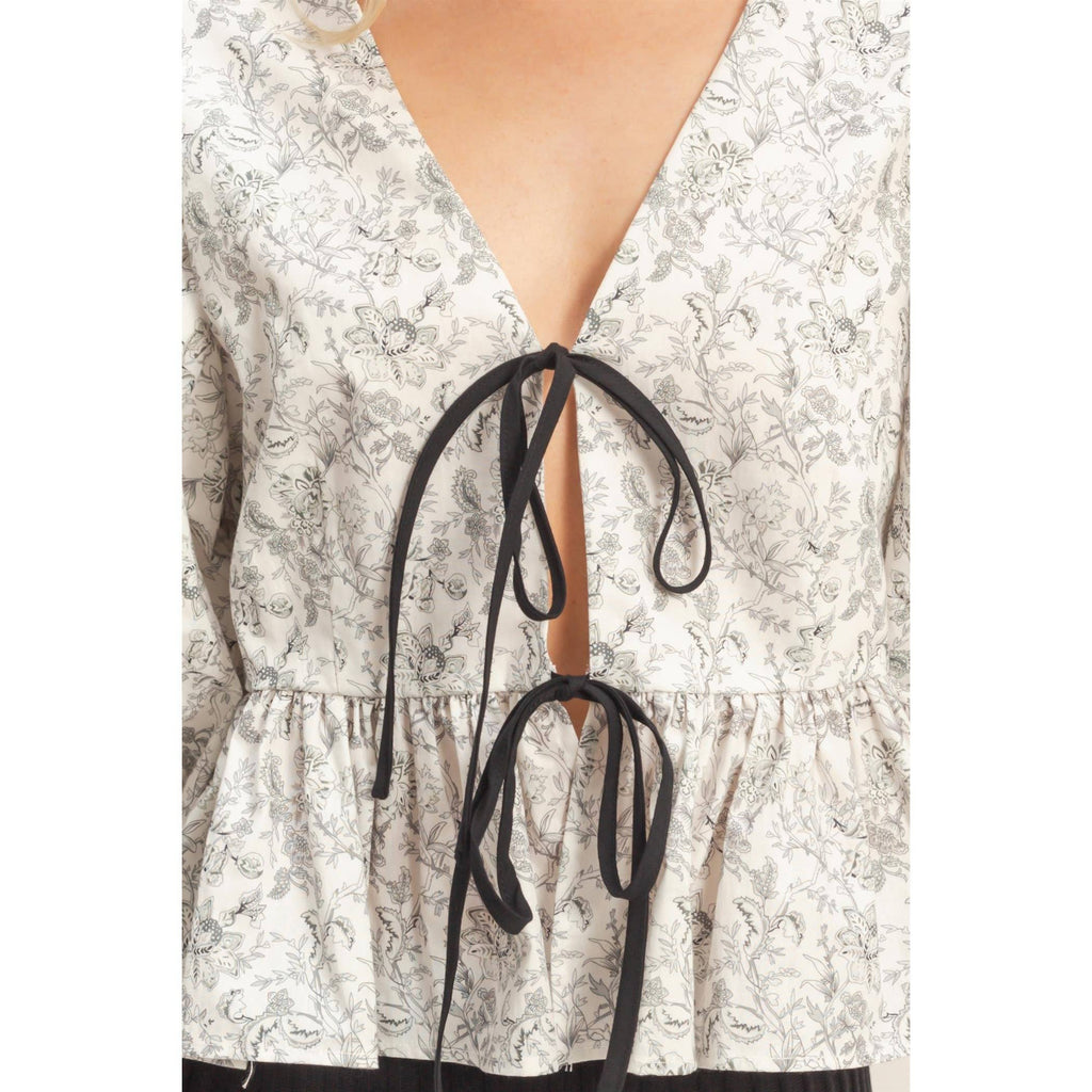 Quiet Praise Peplum Top