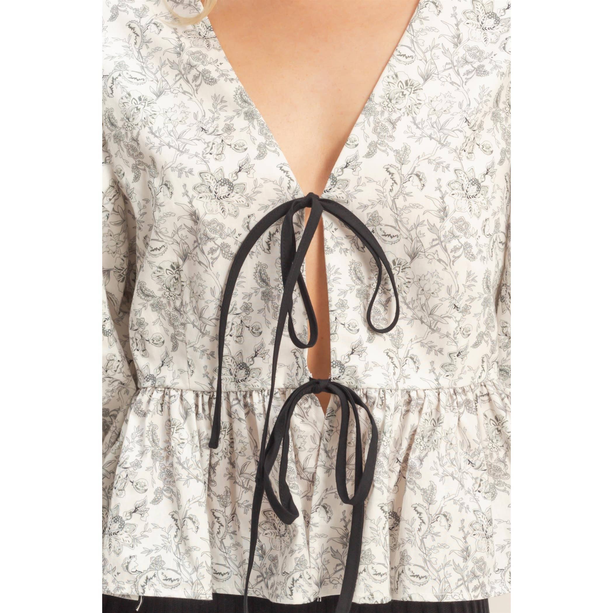 Quiet Praise Peplum Top